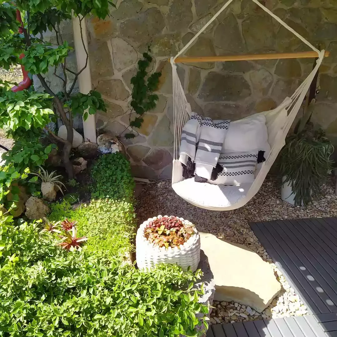 29 Stunning Backyard Hammock Ideas to Create Your Perfect Relaxation Retreat 7 A Cozy Little Nook