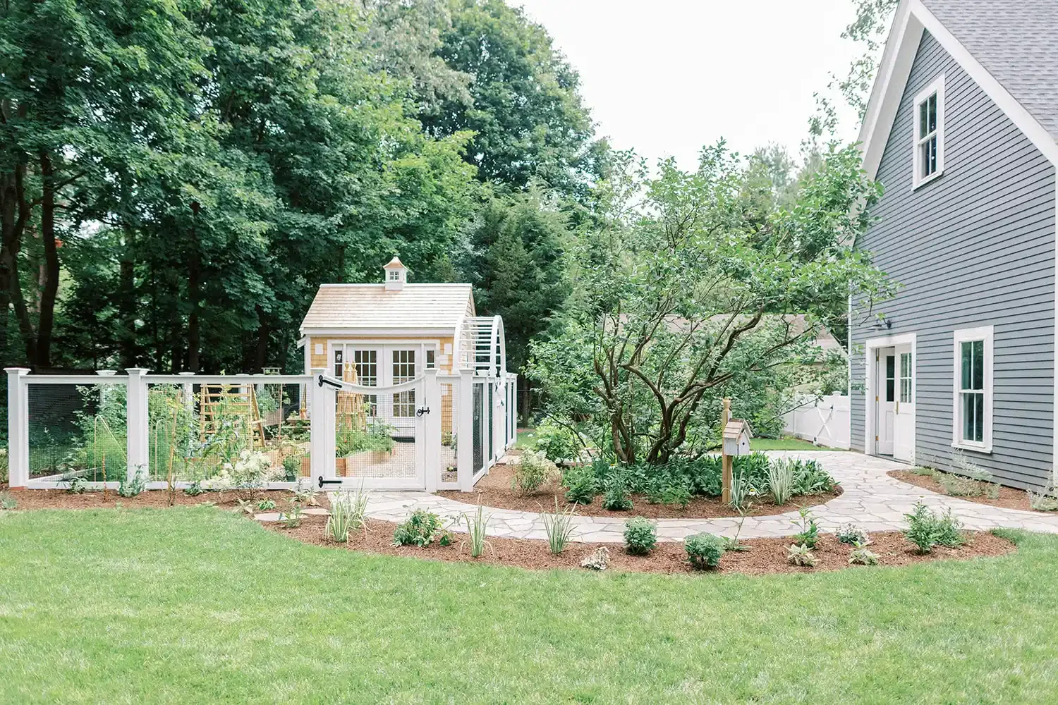 27 Gorgeous Garden Pathway Ideas to Transform Your Outdoor Space A Curved Pathway