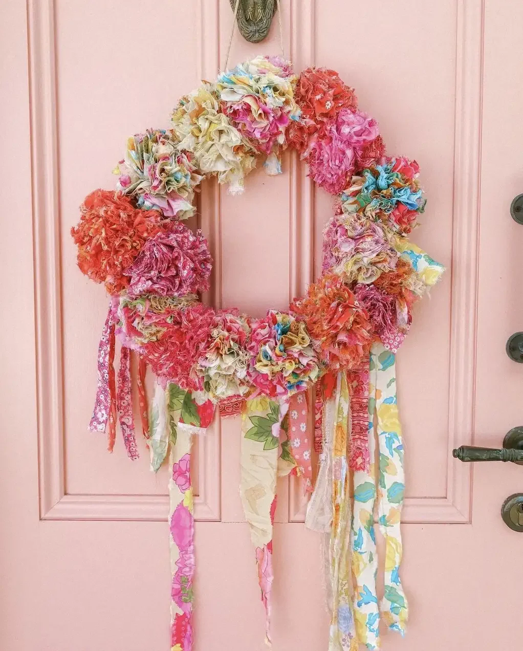 25 Beautiful Summer Wreath Ideas to Brighten Your Front Door 11 A DIY Pom Pom Wreath