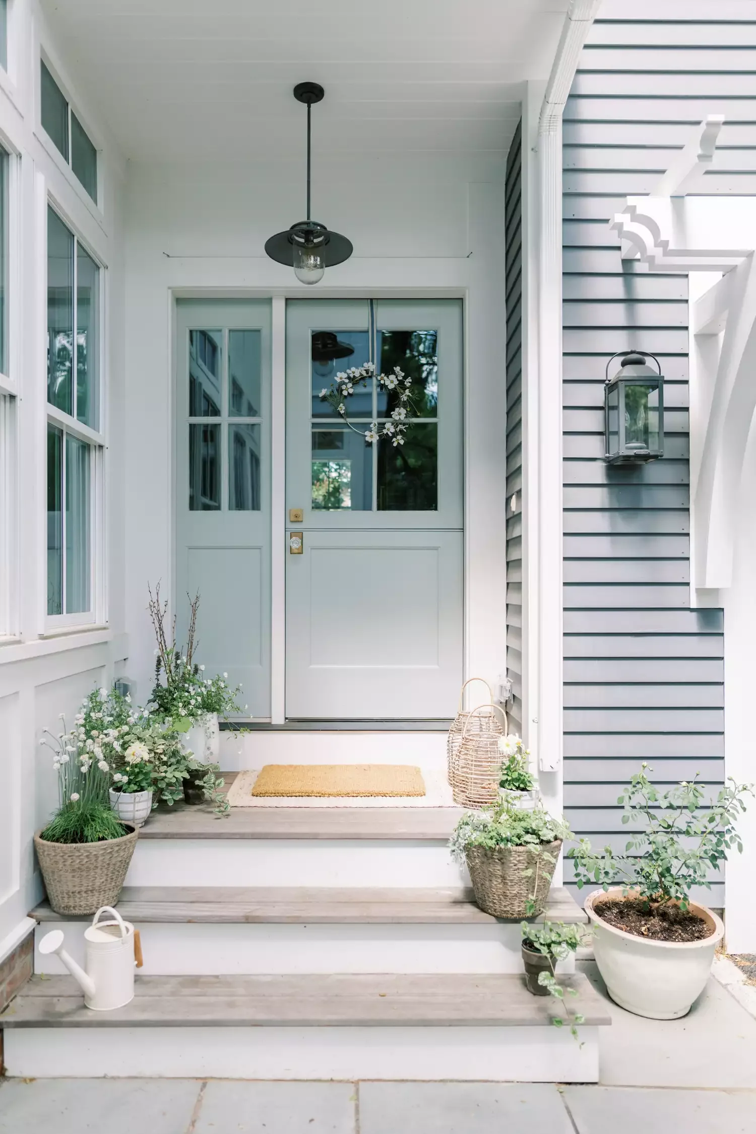 25 Beautiful Summer Wreath Ideas to Brighten Your Front Door 23 A Delicate Floral Wreath