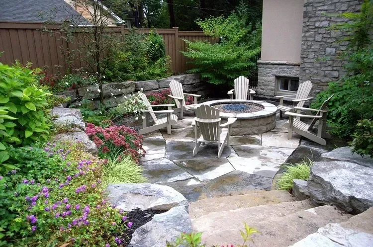 20 Budget-Friendly Backyard Designs That Ditch the Grass (and All That Maintenance) 4 A Firepit Area