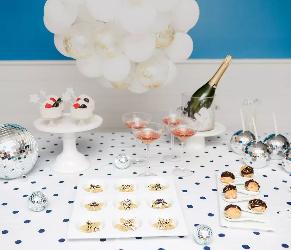 33 Creative New Year's Eve Home Party Ideas to Transform Your Space 11 A Glam Dessert Table