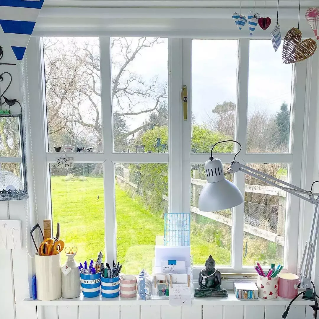 26 Stunning Window Sill Styling Ideas That Will Transform Your Space 18 A Ledge of Office Supplies