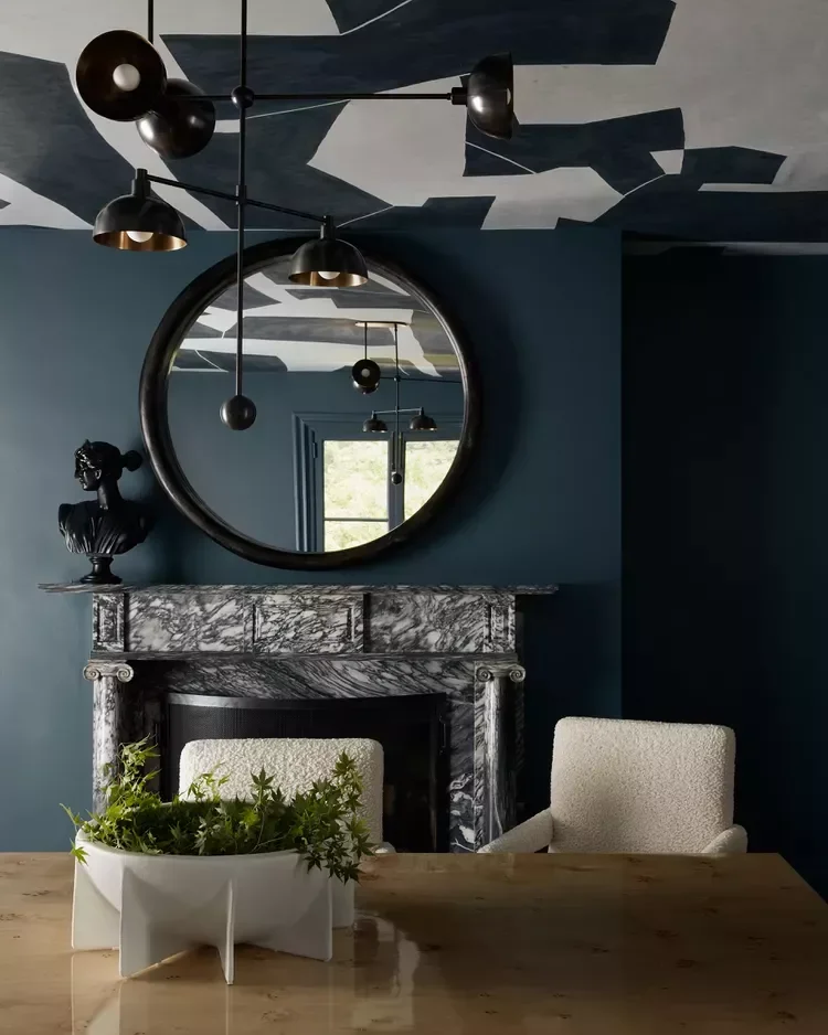 32 Living Room Mantle Decor Ideas That Add Style and Warmth 26 A Magnificent Bust