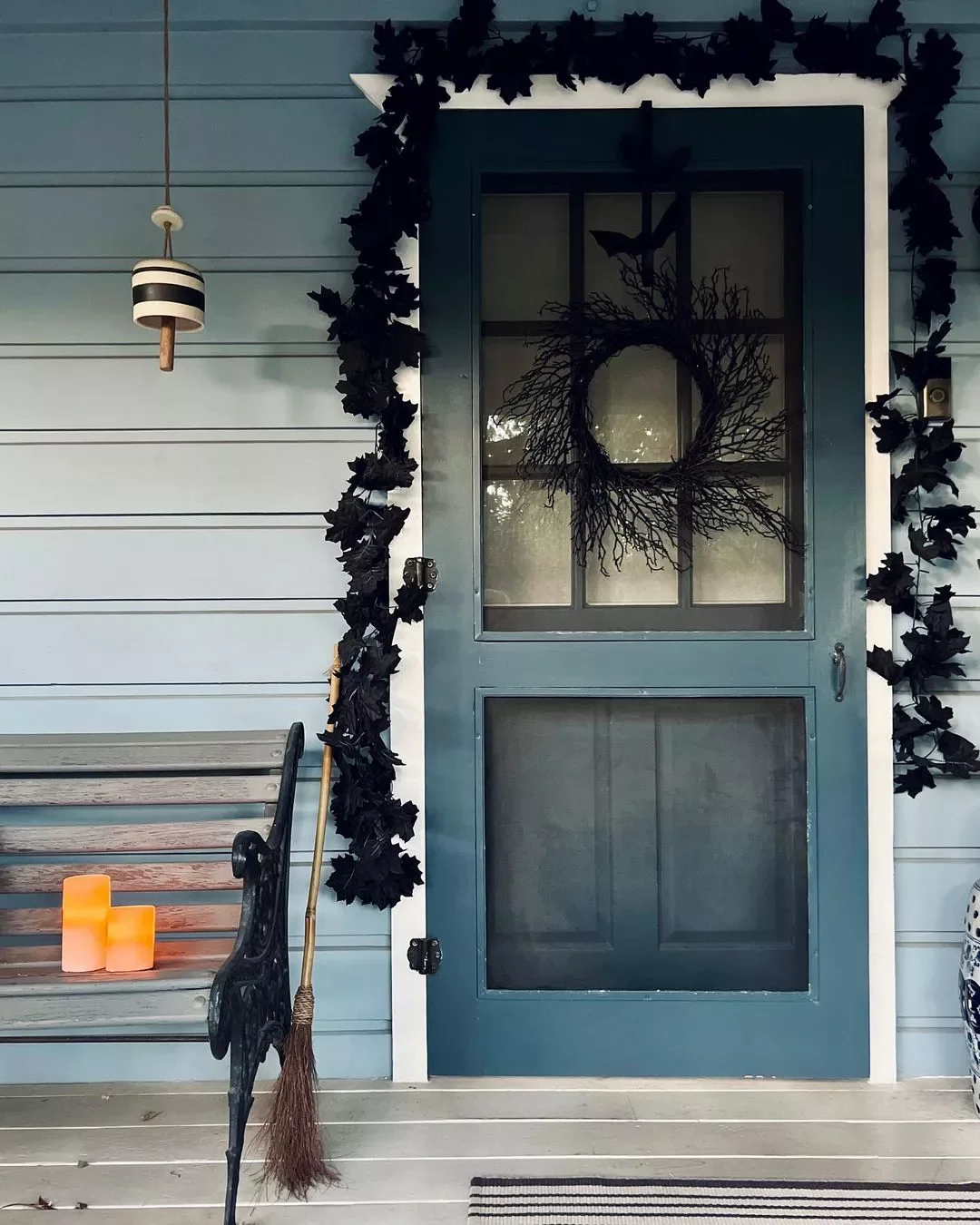 28 Creative Halloween Decorating Ideas You'll Want to Try Right Now 10 A Midnight Black Garland