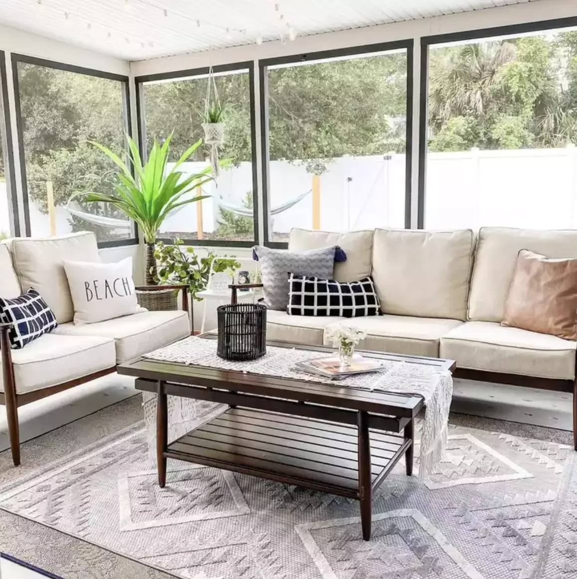 29 Stunning Three-Season Porch Ideas That'll Make You Want to Live Outdoors 16 A Minimalist Approach