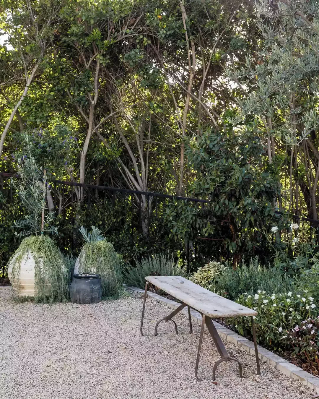 20 Budget-Friendly Backyard Designs That Ditch the Grass (and All That Maintenance) 12 A Perfect Balance
