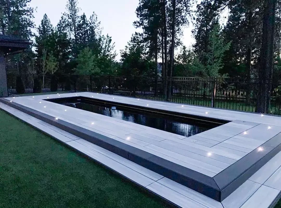 50 Semi-Inground Pool Designs That Transform Any Backyard Into Your Personal Paradise A Pool With Custom Lights