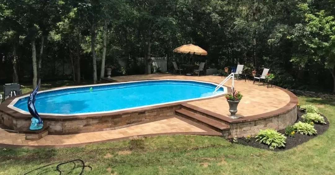 50 Semi-Inground Pool Designs That Transform Any Backyard Into Your Personal Paradise A Pool With a Curved Deck