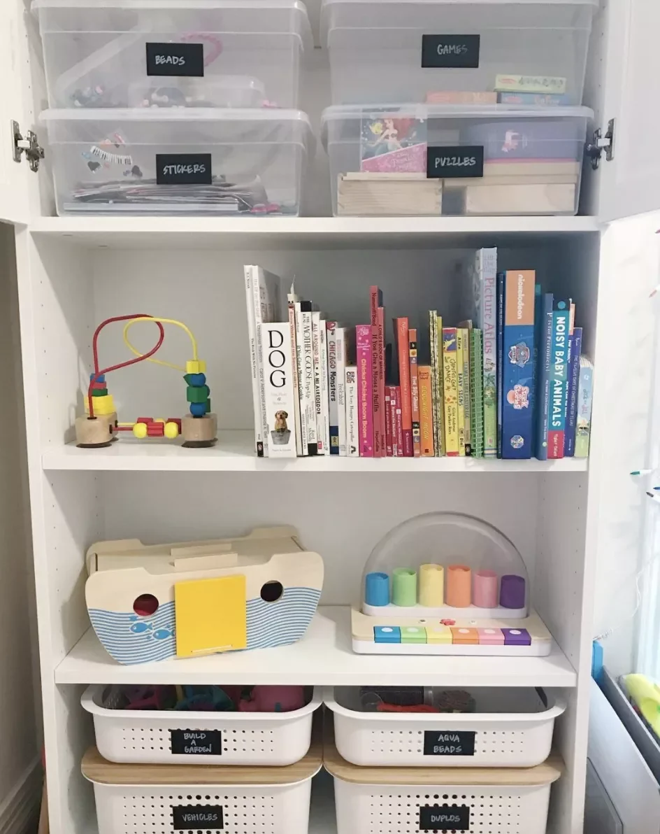 A Shelf With Storage Bins for Toys