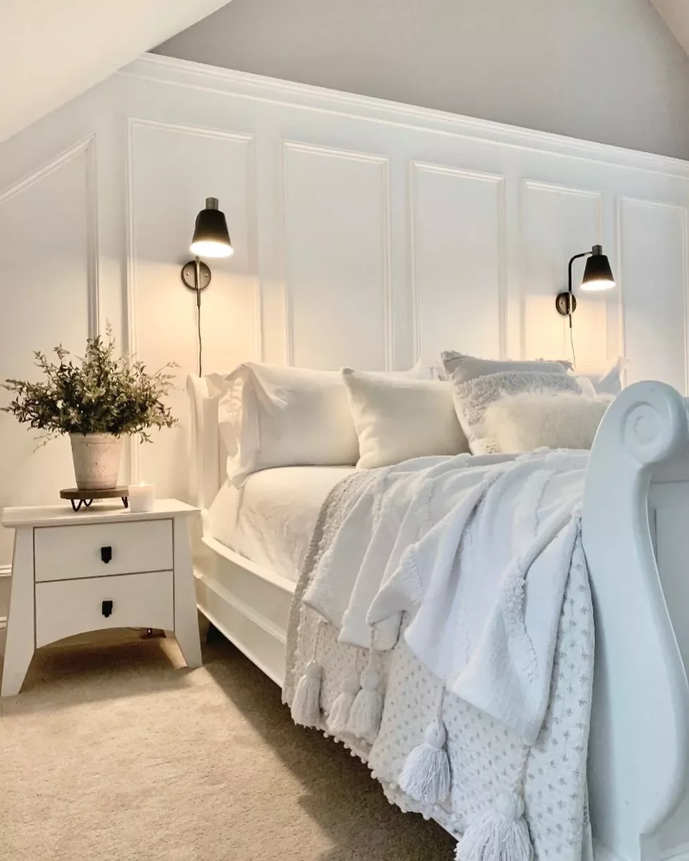 40 White Bedroom Ideas That Will Transform Your Space Into a Stunning Retreat 37 A White Bedroom With a Sleigh Bed