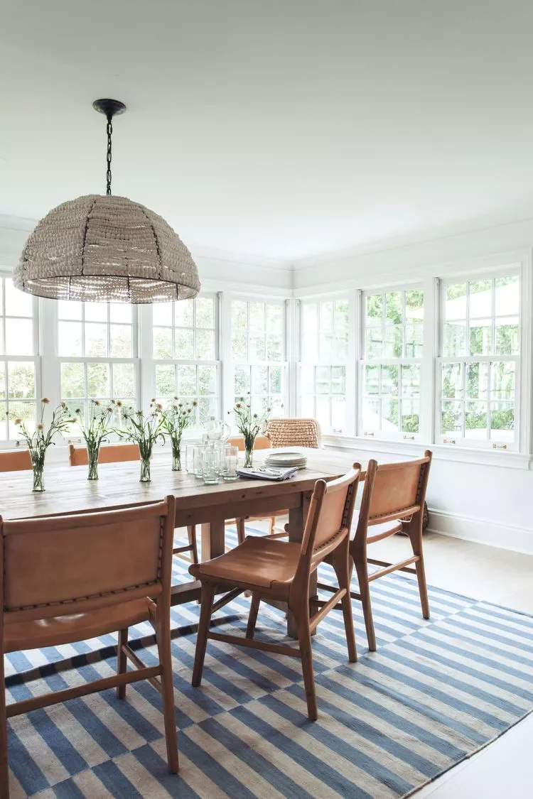 50 Stunning Sunroom Ideas That Transform Your Home Into a Light-Filled Paradise 46 Accent With Wood and Leather