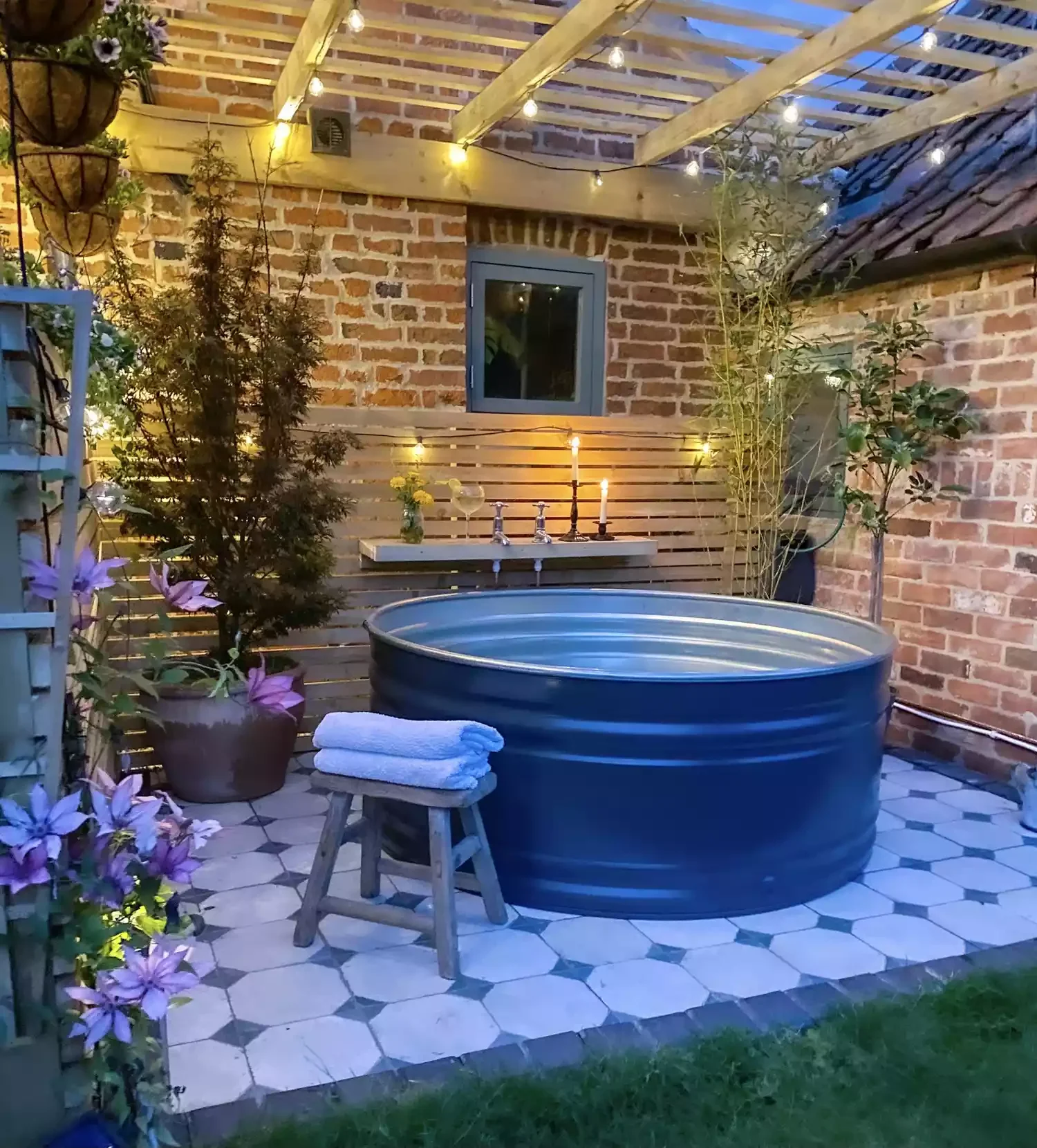 33 Creative Stock Tank Pool Ideas to Transform Your Backyard 30 Add Ambient Lighting