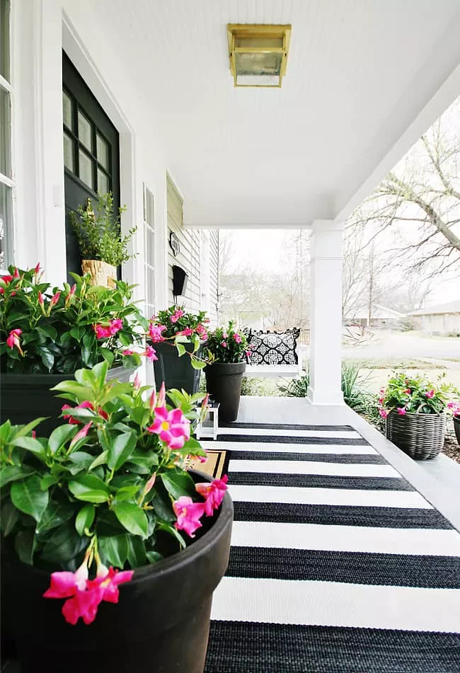 62 Warm and Inviting Front Porch Design Ideas That Welcome Everyone Home 26 Add Bold Patterned Accents