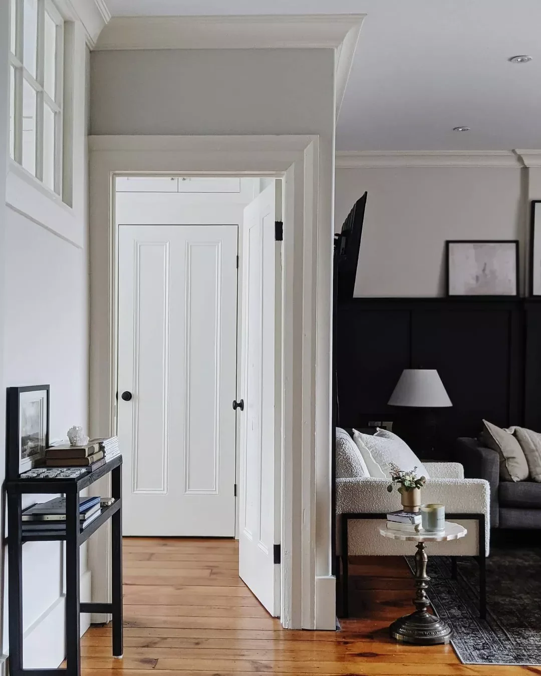 30 Stunning Black and White Living Room Ideas That Will Transform Your Space 4 Add Contrasting Wainscoting