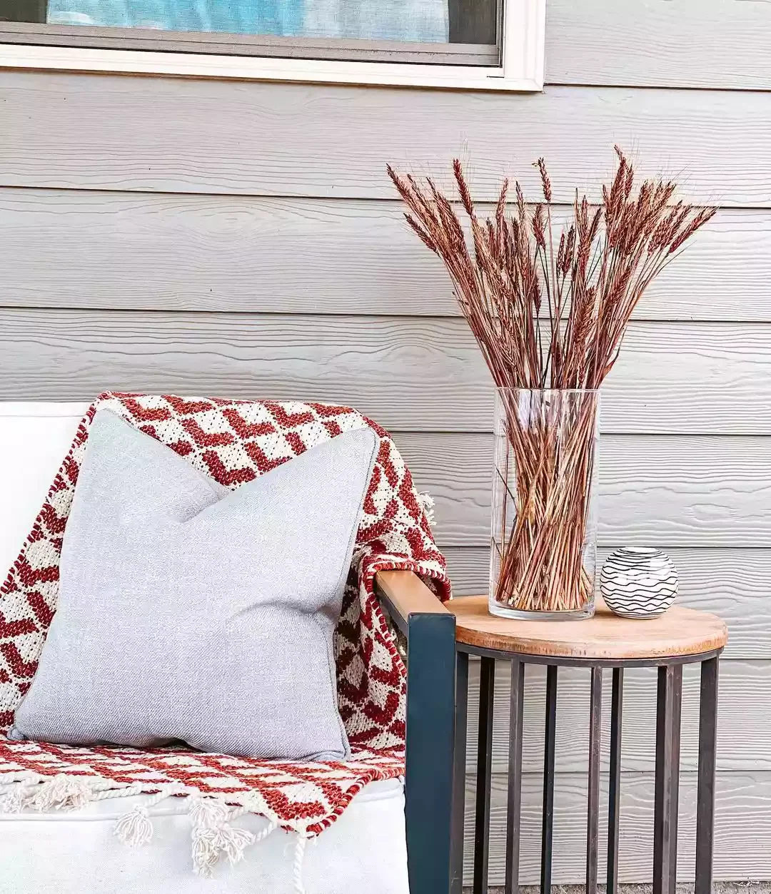 41 Beautiful Fall Outdoor Decorating Ideas to Transform Your Space This Season 26 Add Dried Plants to a Side Table