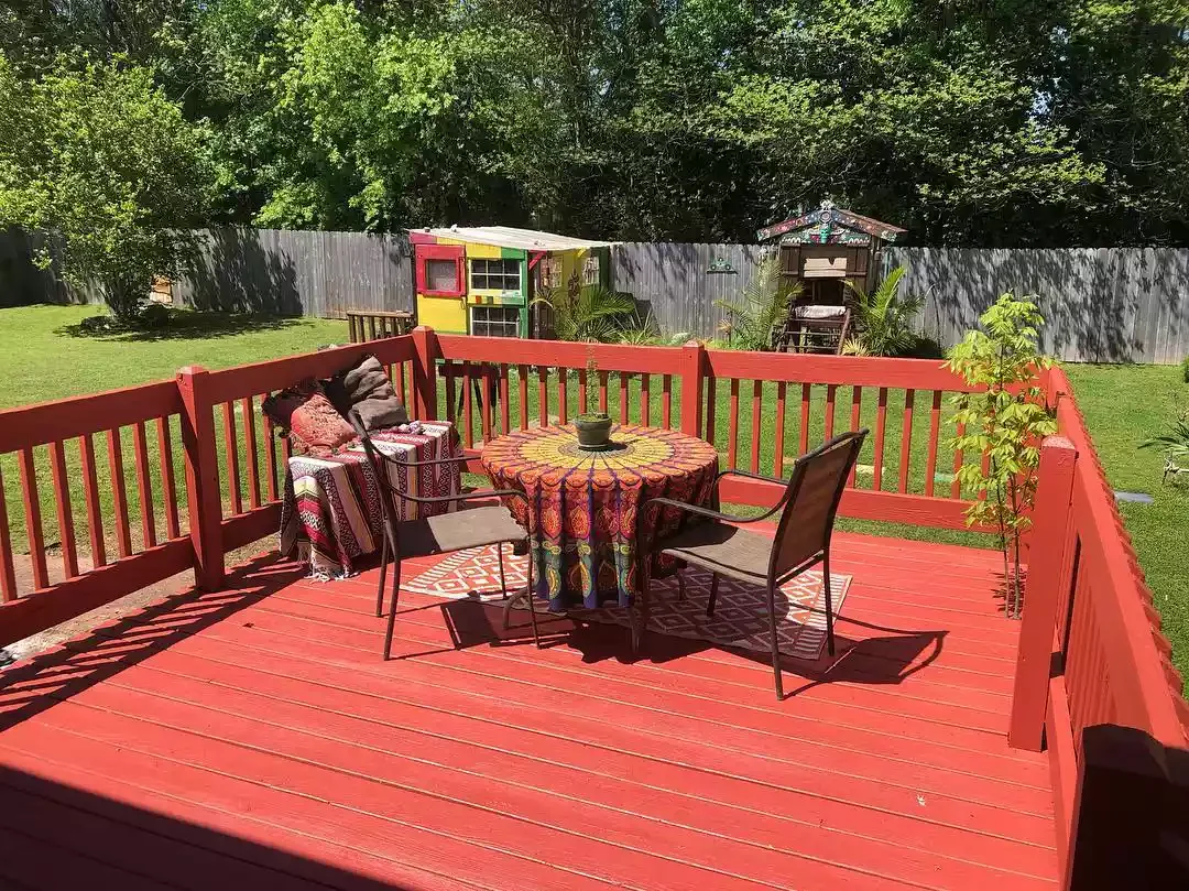 15 Surprising Deck Color Ideas That'll Transform Your Outdoor Space 7 Add Energy to the Yard With Powerful Red