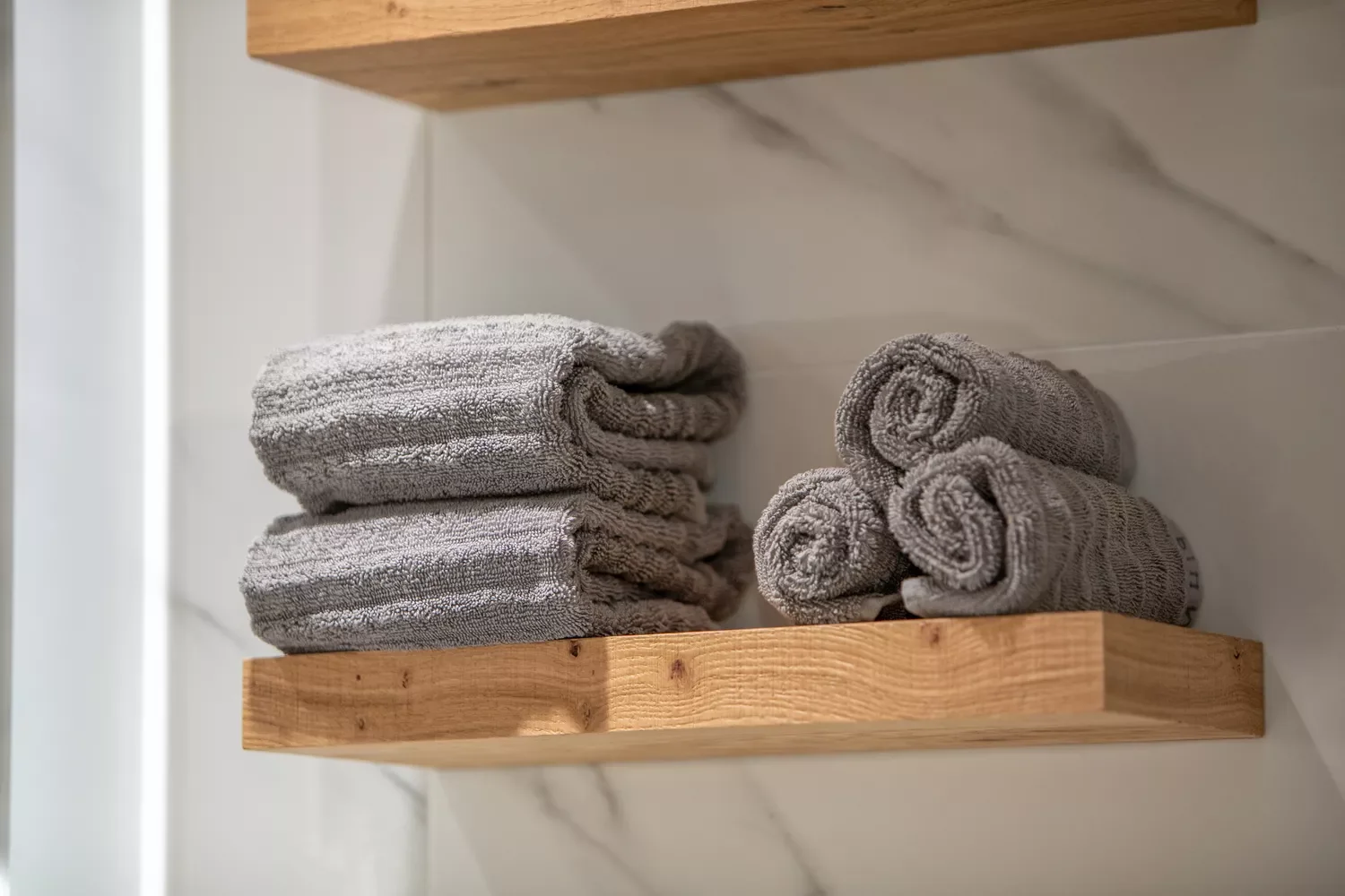 32 Clever and Stylish Ways to Store Your Towels Add Floating Shelves
