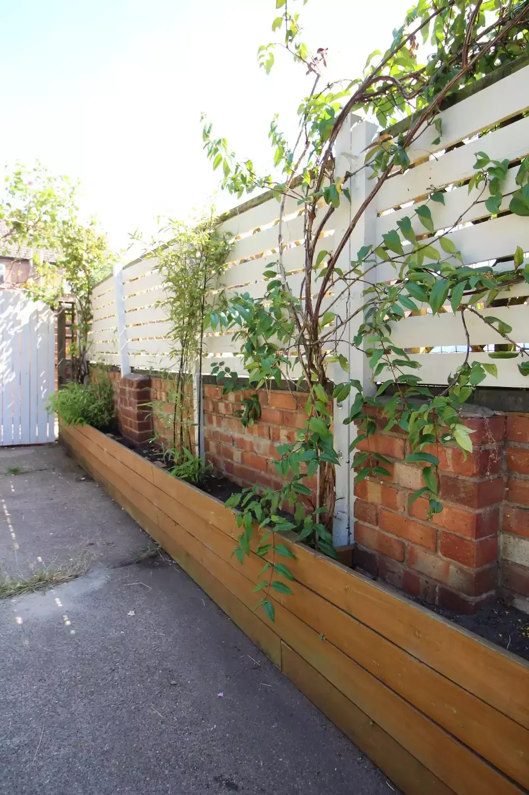 52 Stunning Wooden Fence Designs That Add Rustic Charm to Your Outdoor Space Add Height to a Brick Ledge