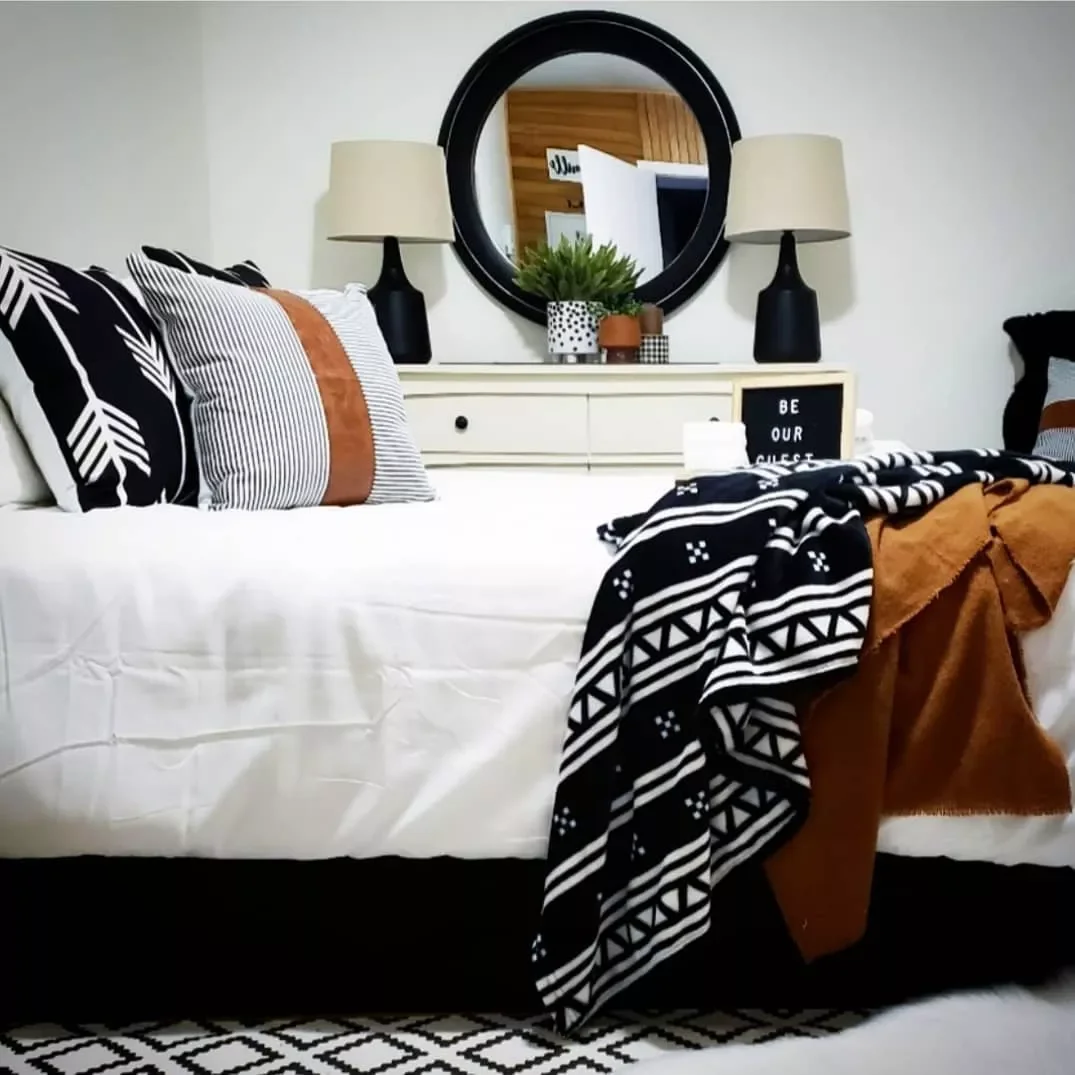32 Stunning Black and White Bedroom Ideas That Will Transform Your Space 24 Add Leather