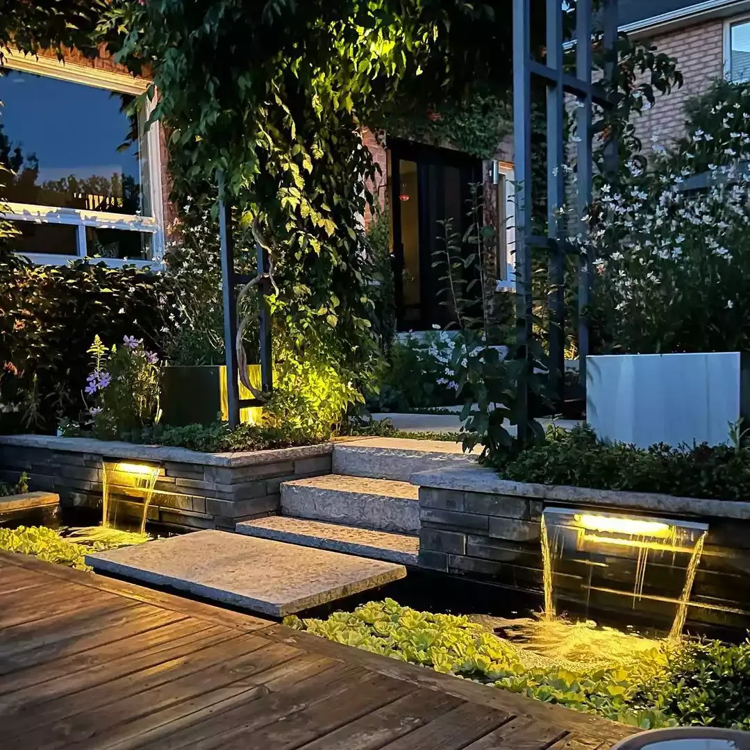 15 Creative Sloped Backyard Transformations That Maximize Your Outdoor Space Add Matching Water Features