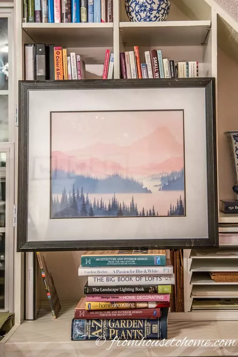 22 Creative Ways to Display Your Favorite Photos at Home Add Oomph to a Bookcase