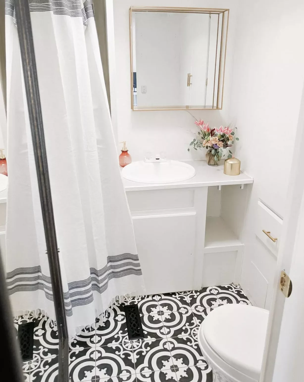 22 DIY Bathroom Makeover Ideas That Won't Break Your Budget 2 Add Peel-and-Stick Flooring
