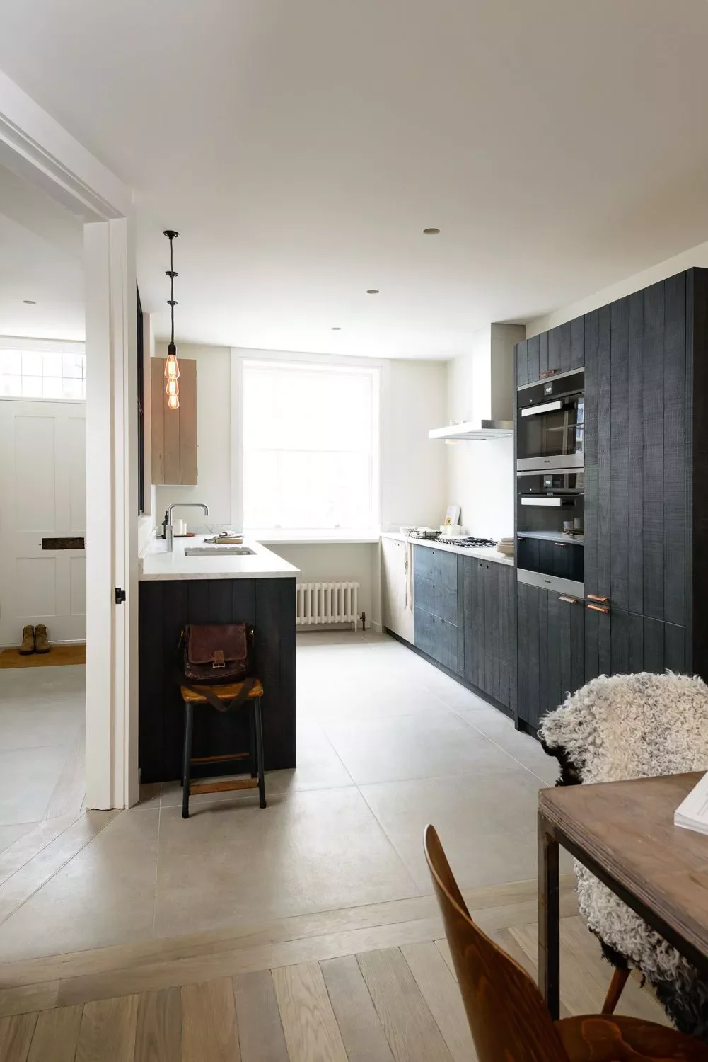 46 Galley Kitchen Design Ideas That Maximize Style and Function 42 Add Textural Wood Cabinets