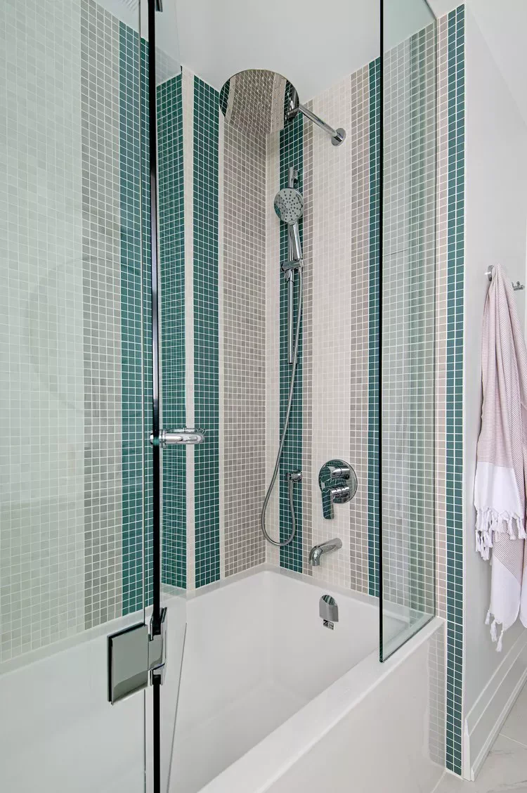 26 Beautiful Bathtub Tile Ideas That'll Transform Your Shower-Tub Into a Designer Masterpiece 11 Add Vertical Stripes
