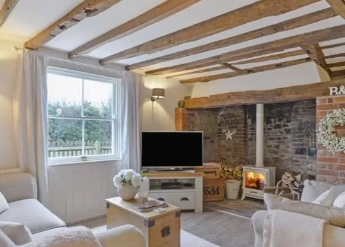 40 Cozy Country Living Room Ideas That Create Instant Warmth 15 Add Wood Ceiling Beams