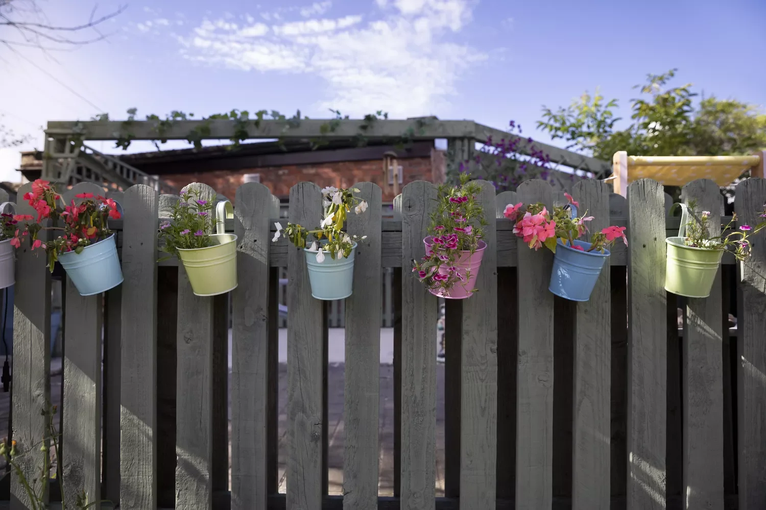 52 Stunning Wooden Fence Designs That Add Rustic Charm to Your Outdoor Space Add Wooden Railing Planters