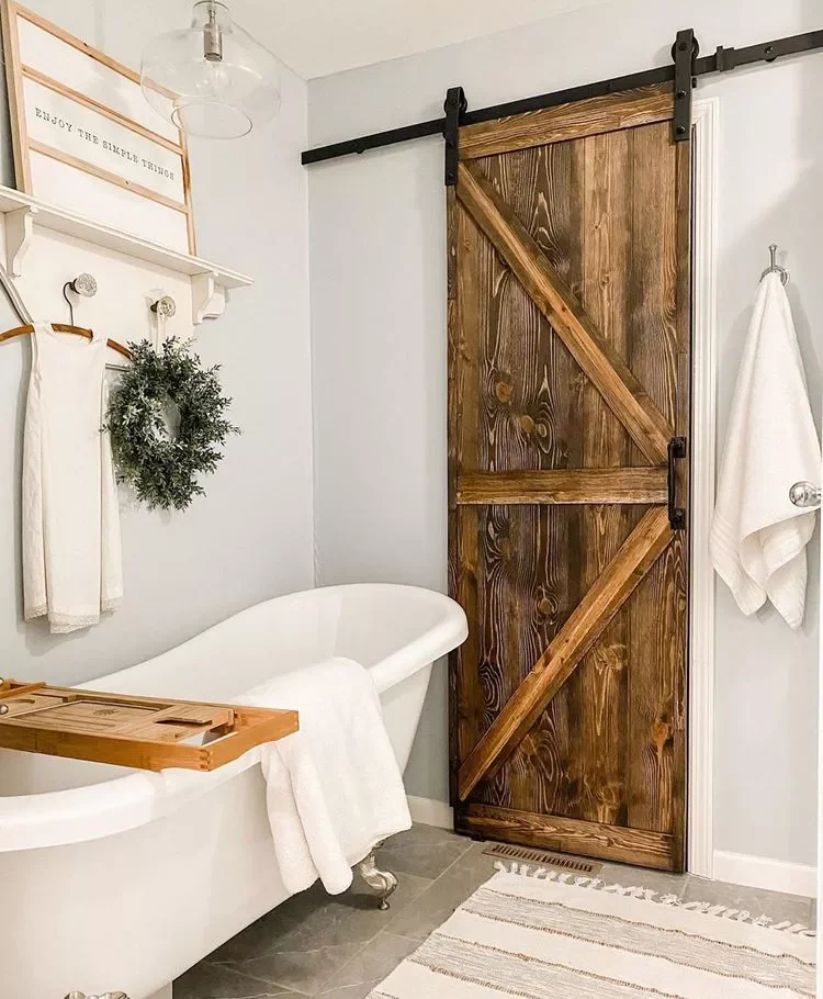 30 Rustic Bathroom Ideas That'll Give You Serious Country Cottage Vibes 24 Add a Barn Door