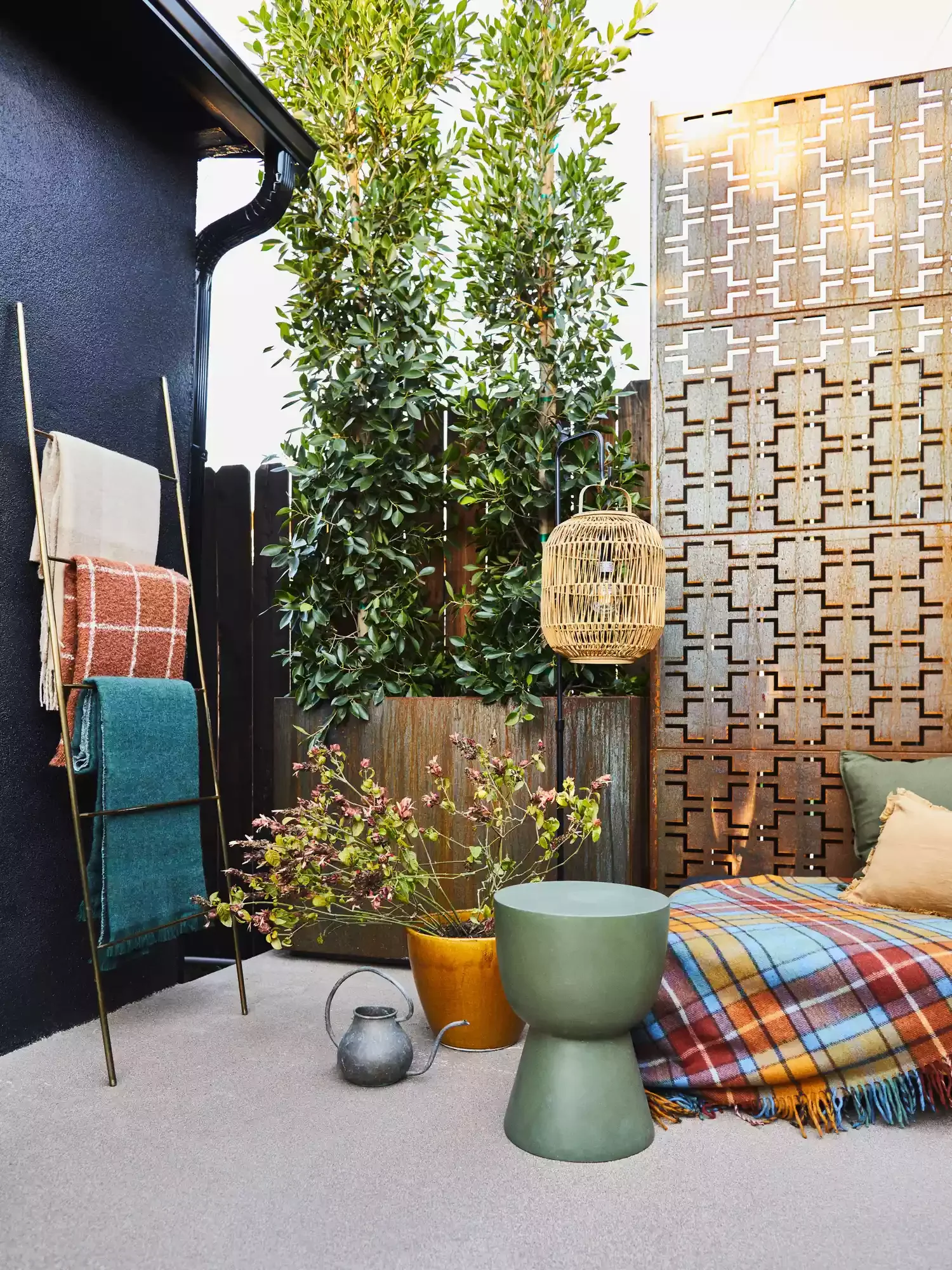 67 Stunning Patio Design Ideas That Will Transform Your Outdoor Living Space 14 Add a Blanket Ladder
