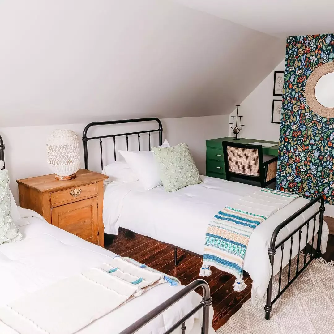 33 Cozy Attic Bedroom Ideas That Will Transform Your Space 30 Add a Bold Feature Wall