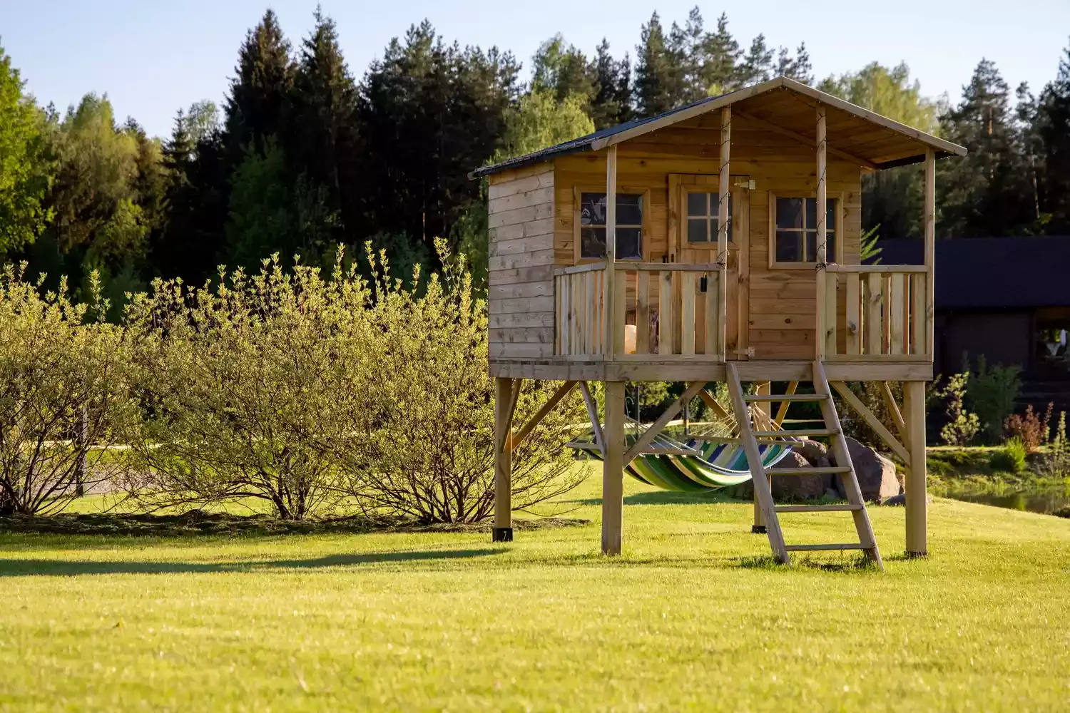 28 Amazing Treehouse Design Ideas That Will Transform Your Backyard 7 Add a Hammock Hangout