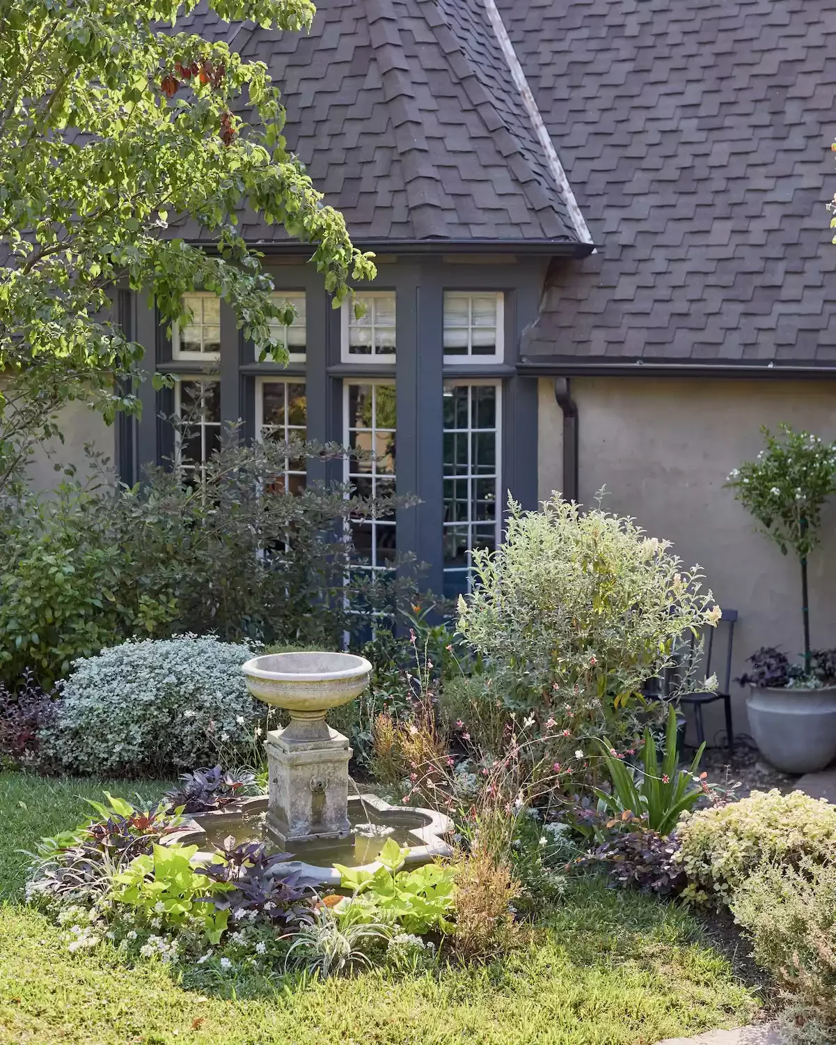 47 Small Front Yard Landscaping Ideas That Will Transform Your Home's Curb Appeal Add a Landscaped Fountain