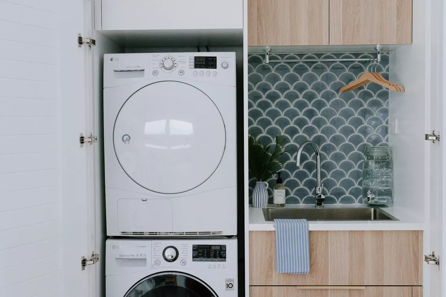 55 Small Laundry Room Ideas That Blend Style With Smart Functionality Add a Laundry Closet Backsplash