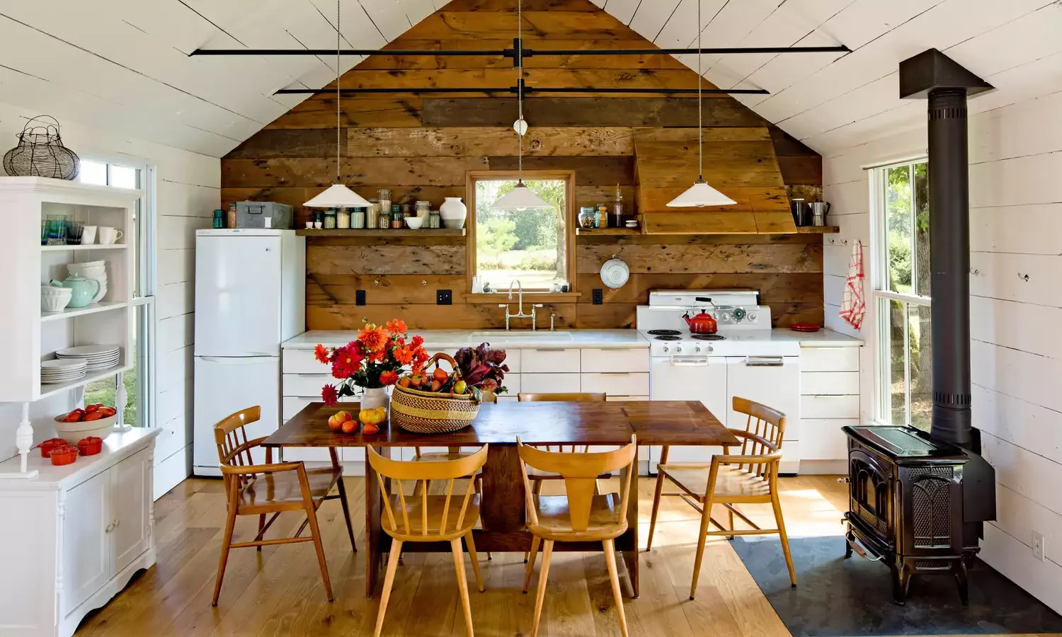 23 Cozy Country Kitchen Ideas That Create Instant Warmth 13 Add a Reclaimed Wood Feature Wall