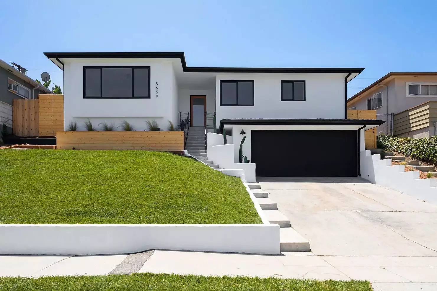 47 Small Front Yard Landscaping Ideas That Will Transform Your Home's Curb Appeal Add a Retaining Wall