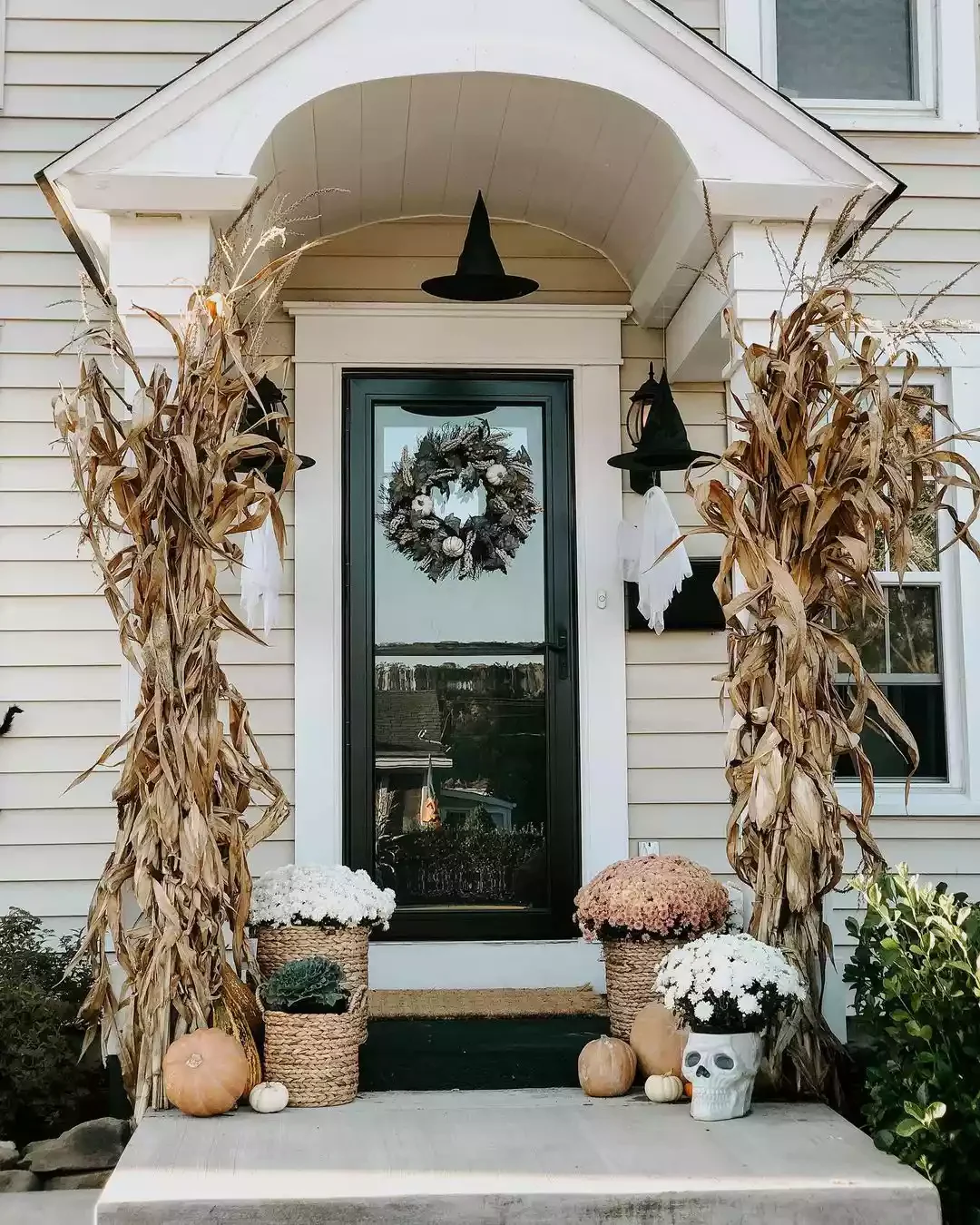 33 Spooktacular Halloween Front Porch Ideas That'll Make Your Home the Neighborhood's Must-See Destination 12 Add a Scary Touch to Your Fall Porch