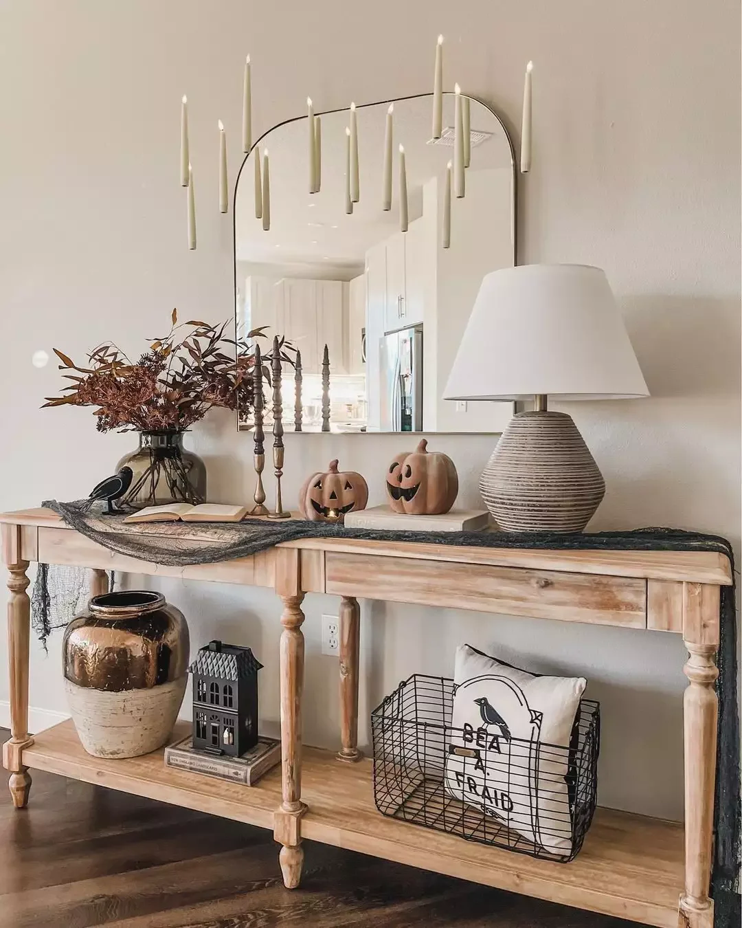 40 Stunning Entryway Lighting Ideas That Will Transform Your Home's First Impression Add a Seasonal Twist With Hanging Flameless Candlesticks