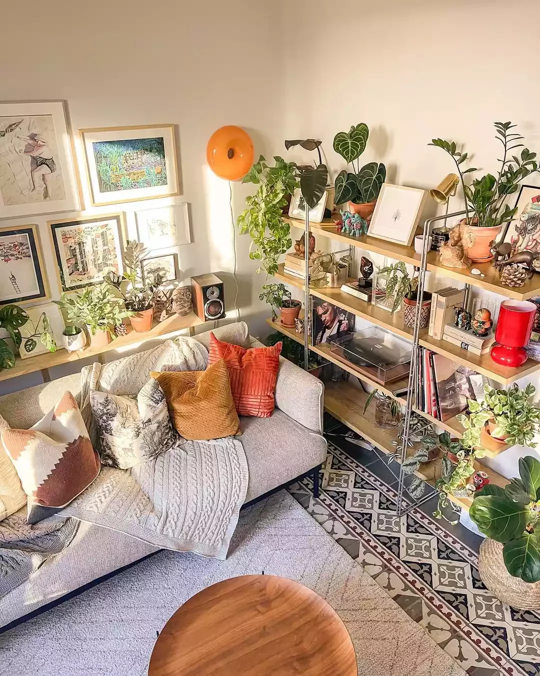 15 Creative Plant Display Ideas That'll Transform Your Home Into a Green Paradise 9 Add a Shelf Behind the Sofa