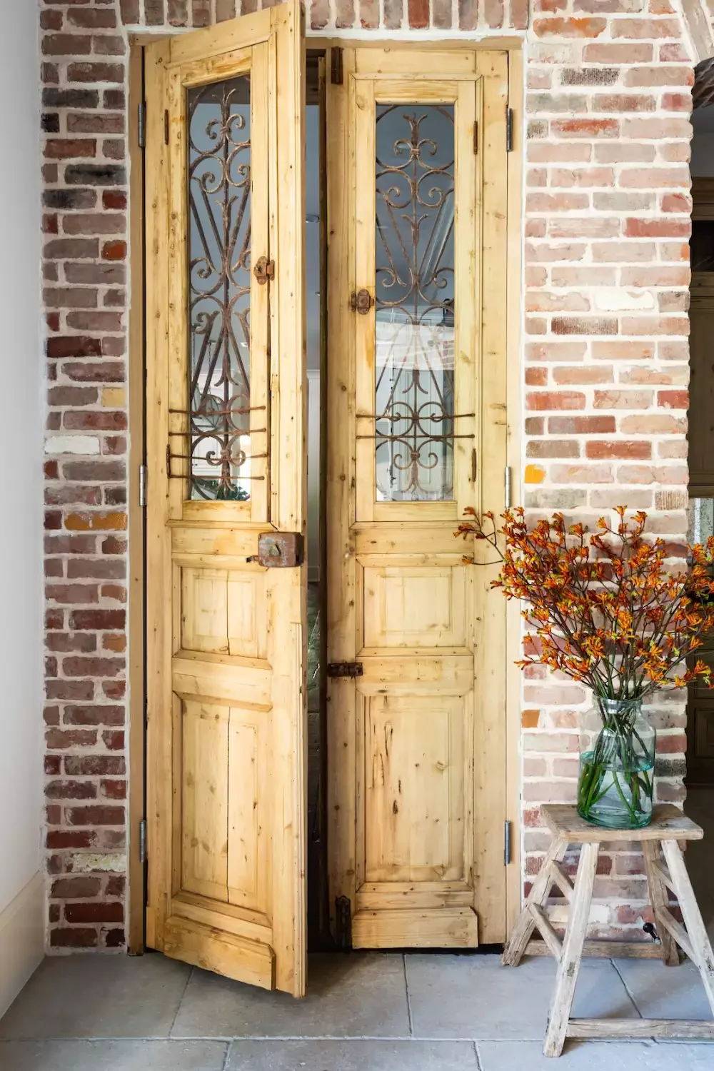 39 Stunning Front Door Decor Ideas to Welcome Every Season Add a Simple Stool and Vase