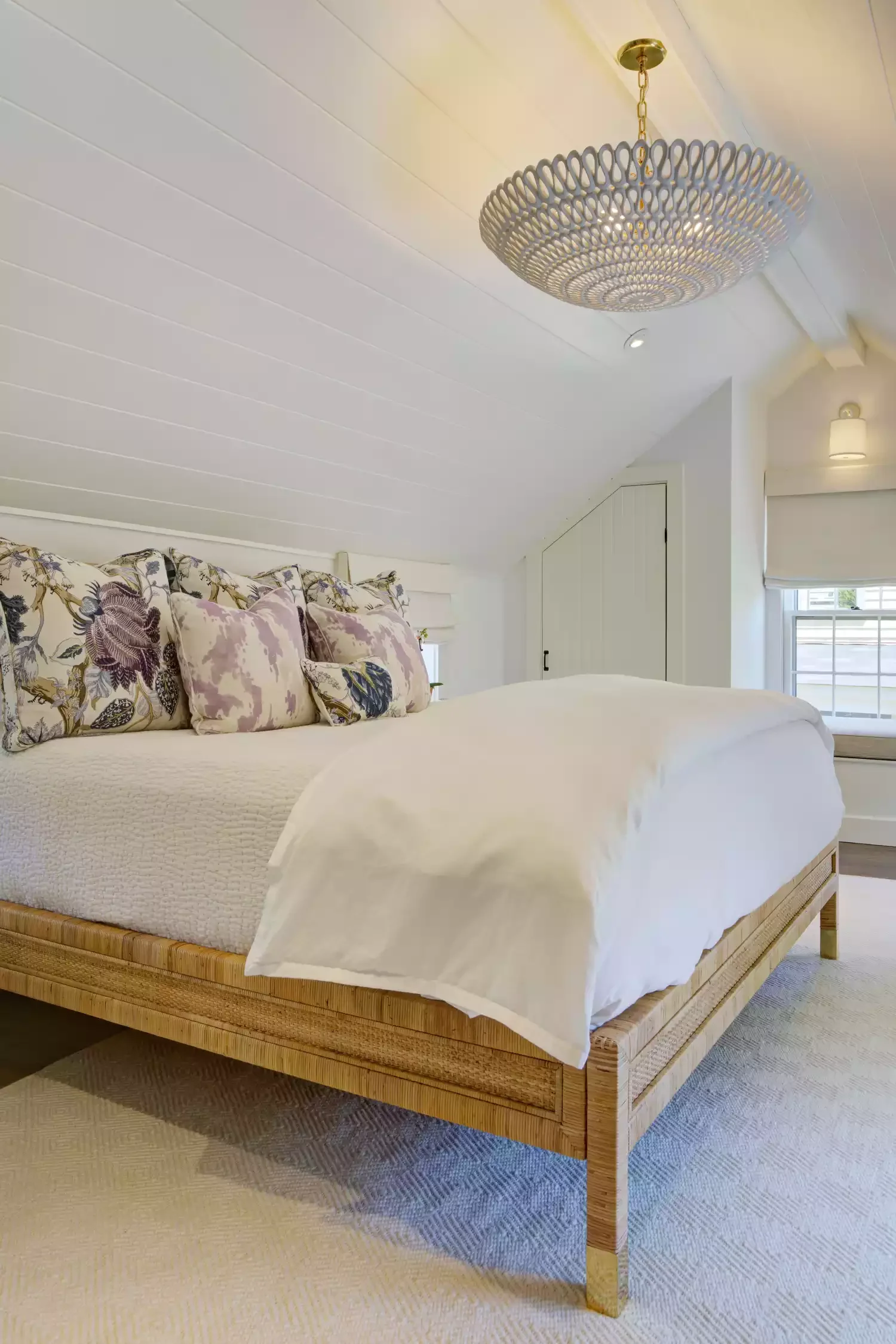 33 Cozy Attic Bedroom Ideas That Will Transform Your Space 4 Add a Statement Light