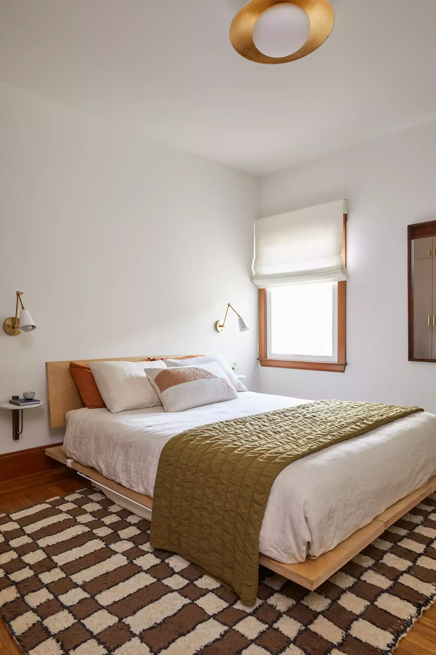 35 Creative Apartment Bedroom Ideas to Transform Your Small Space 12 Add a Statement Rug