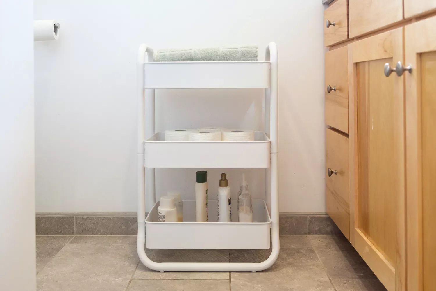 35 Brilliant Bathroom Organization Ideas That Will Transform Your Space Instantly Add a Tiered Organizer