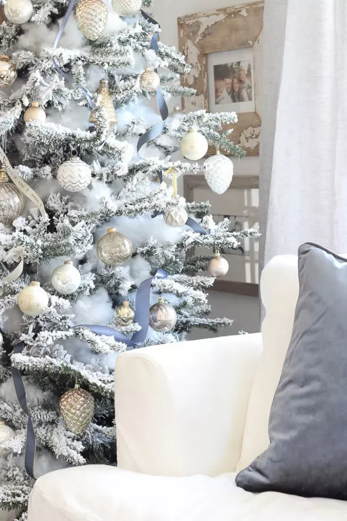 27 Stunning Flocked Christmas Tree Ideas That Transform Your Holiday Decor 14 Add a Touch of Baby Blue