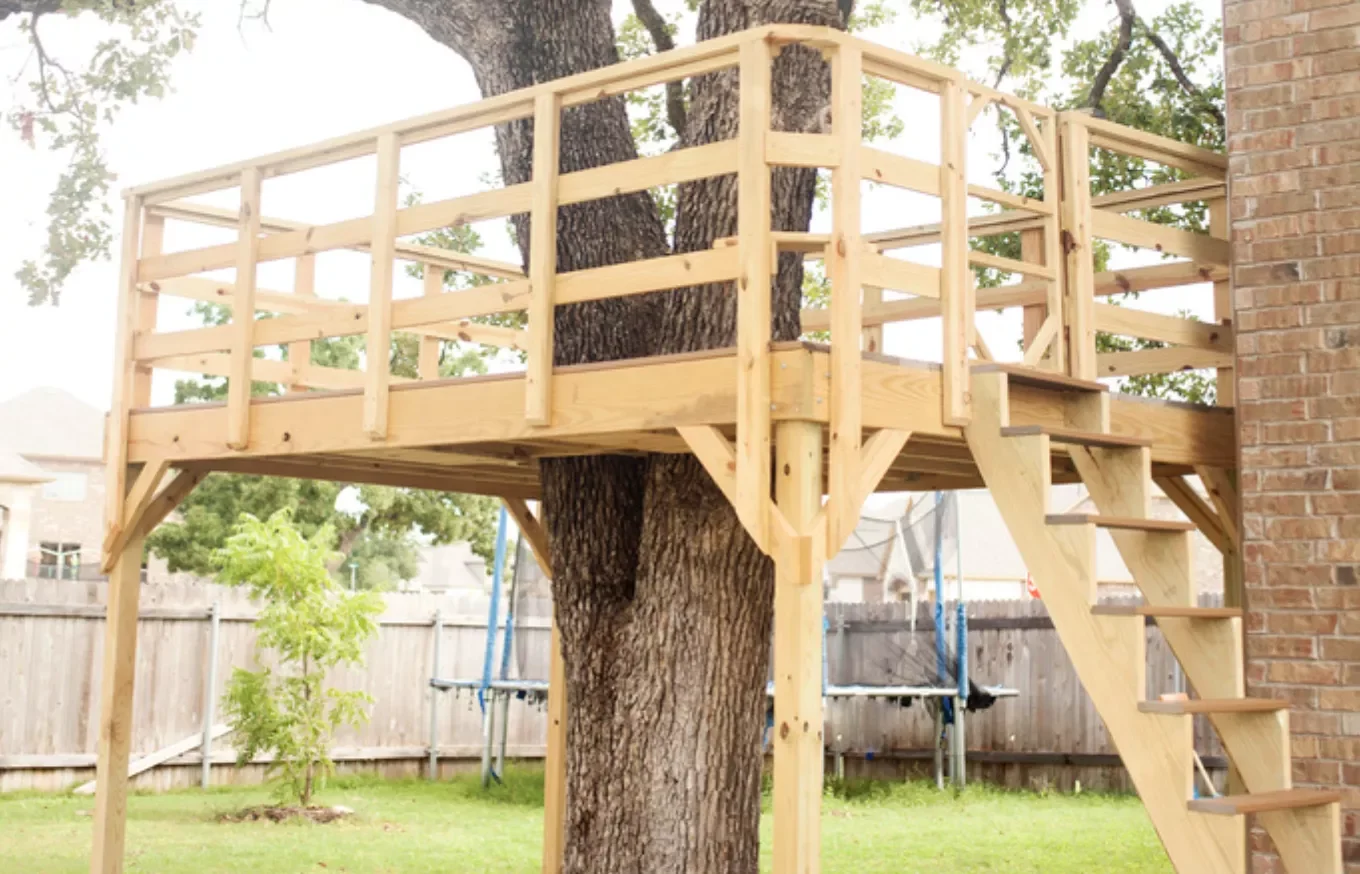28 Amazing Treehouse Design Ideas That Will Transform Your Backyard 16 Add a Trapdoor Tree Deck