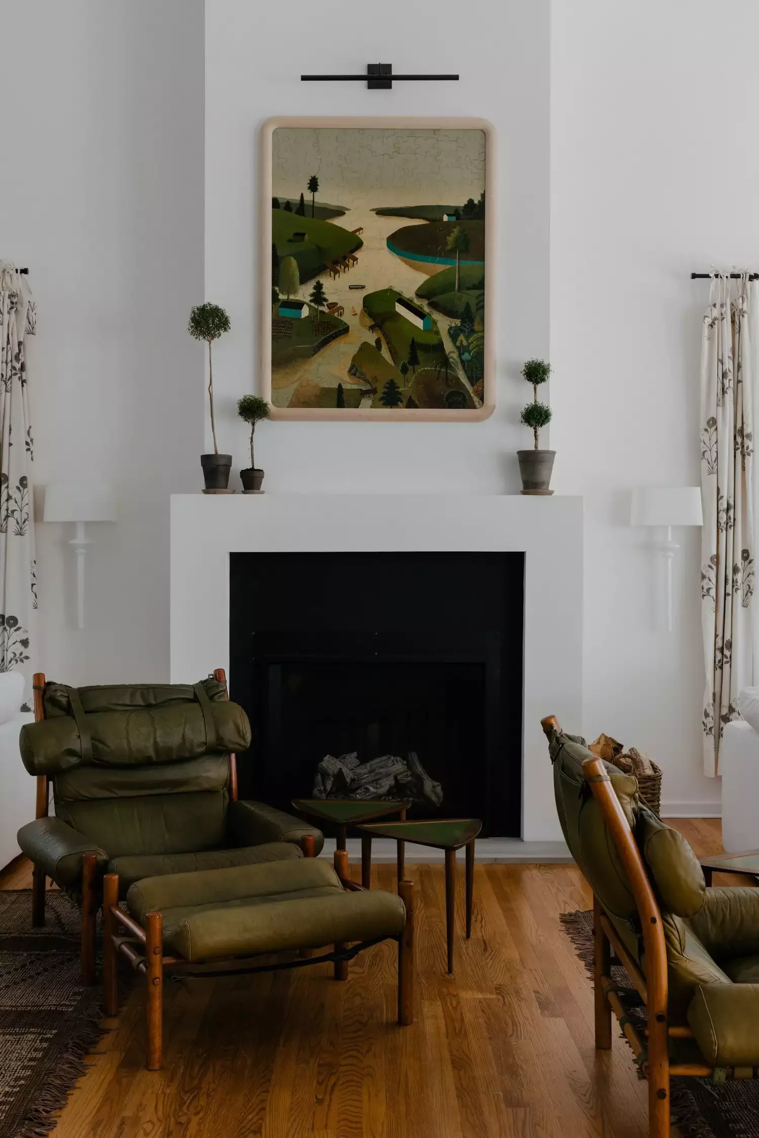 57 Stunning Fireplace Decorating Ideas to Transform Your Living Space 47 Add a Trio of Topiaries