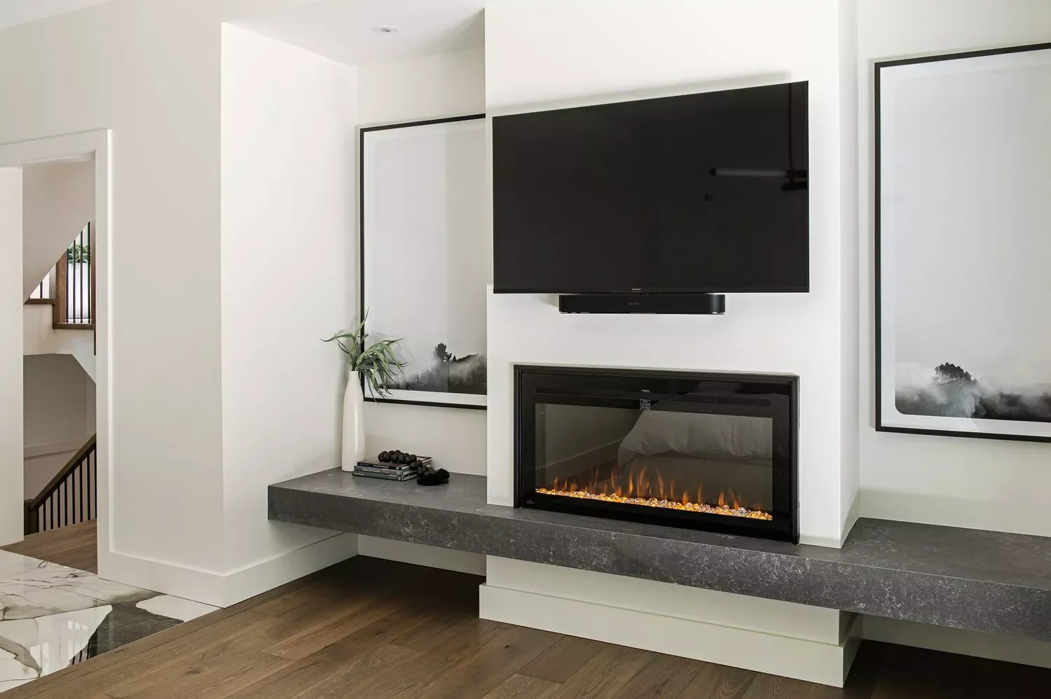 25 Stunning Electric Fireplace and TV Combinations That Look Professionally Designed 19 Add a Wall-to-Wall Bench